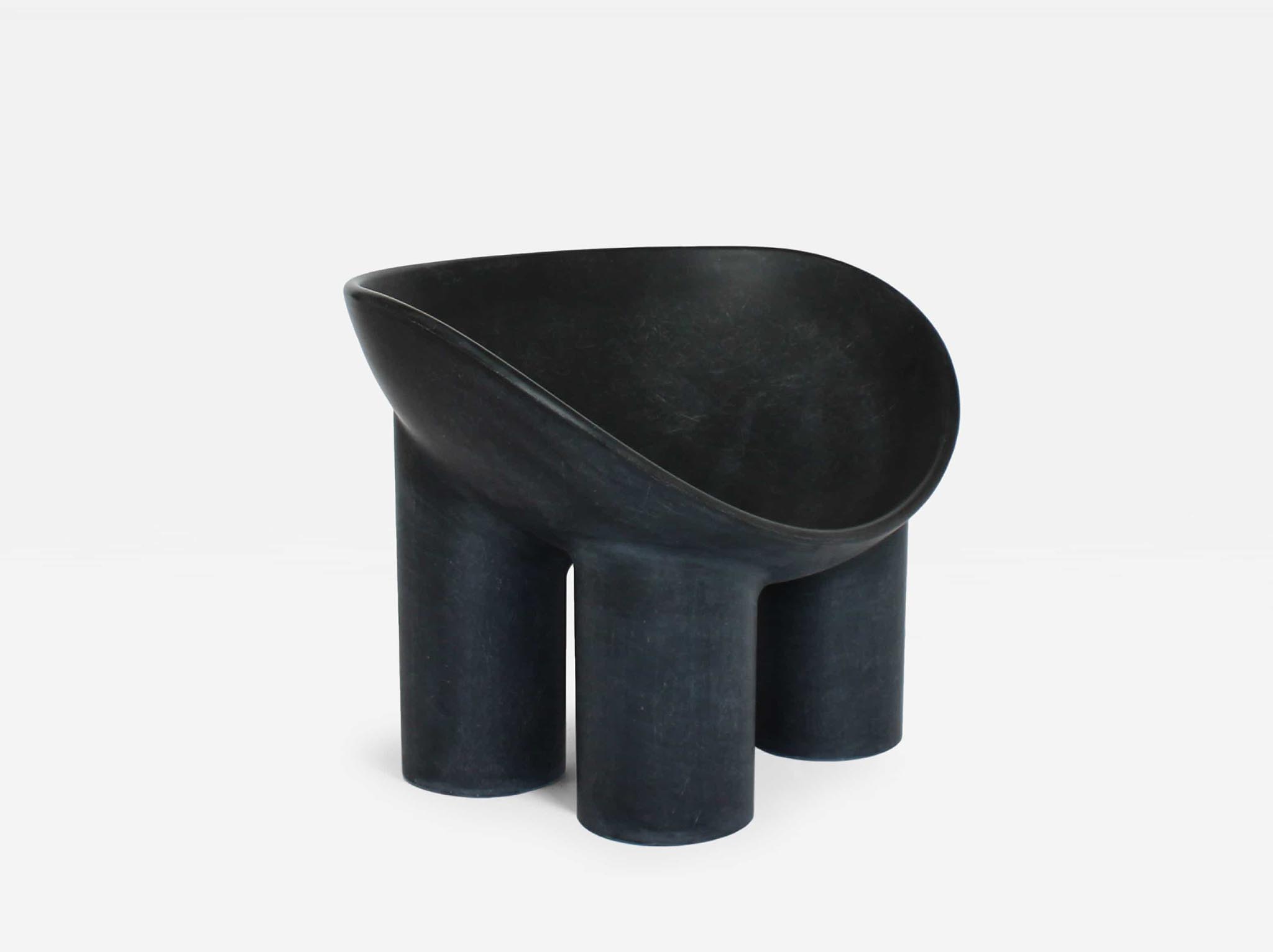contemporary black polyethylene armchair by Faye Toogood