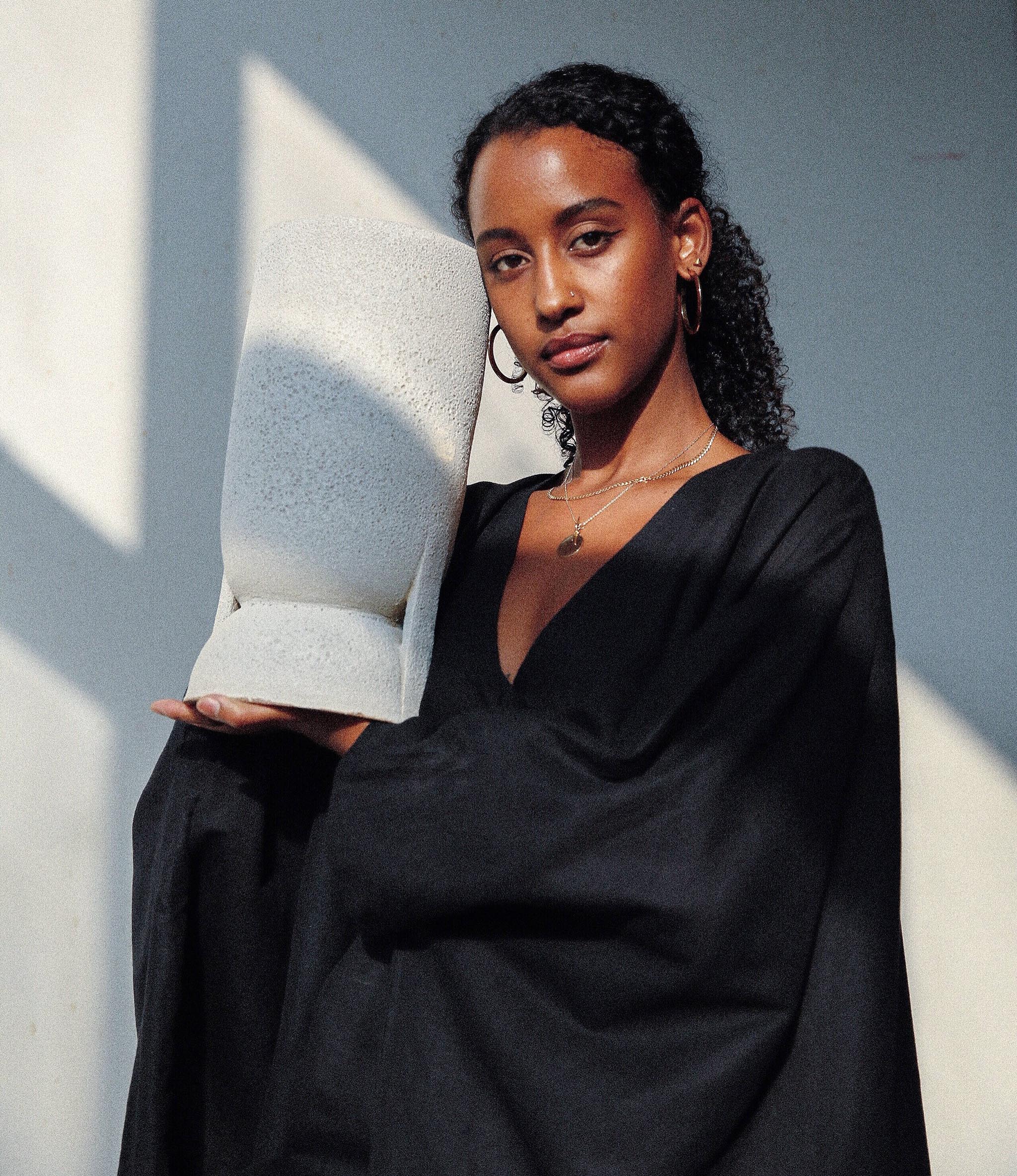 Headshot of African designer Dina Nur Satti